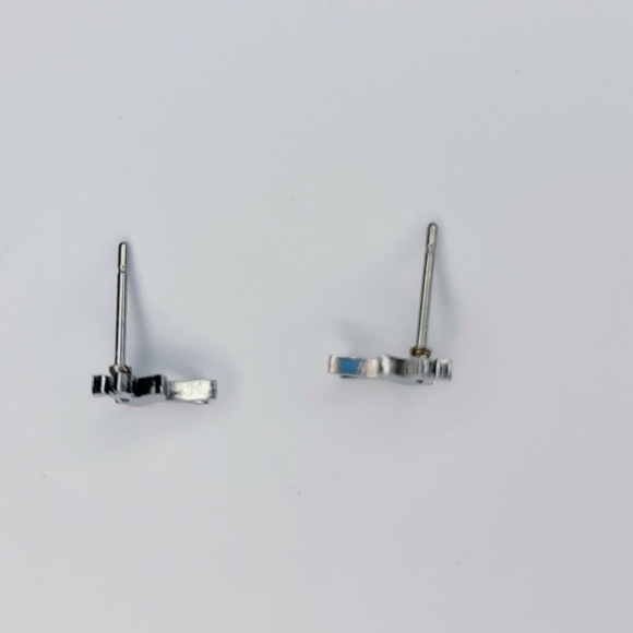 Cute small silver ballerina shaped stainless steel stud earrings. ~8mm tall - Picture 3 of 4